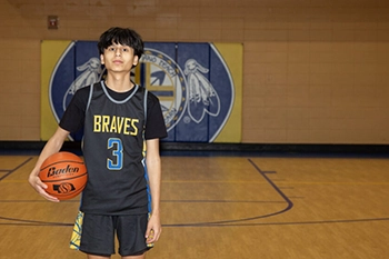 Jevjuan, an eighth grader at St. Joseph’s Indian School, recently took part in an intense battle to the podium during the State Free Throw Contest.