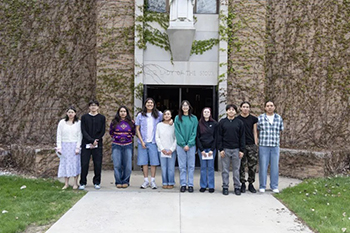 St. Joseph’s graduating seniors stood outside Our Lady of the Sioux Chapel, greeting community members before the senior prayer service.