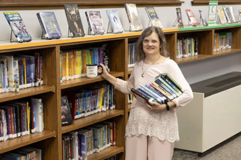 St. Joseph’s Indian School Librarian Claire Nehring was recently honored for the impact she makes in the lives of young readers.