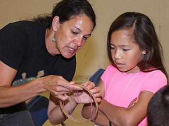 A female student in Native American studies class