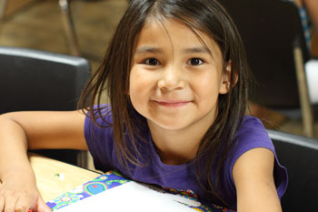 Lakota girl focusing on her school work.